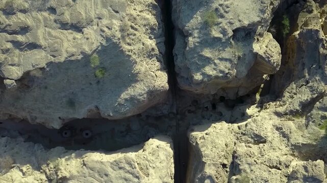 Stunning Aerial View of Qeshm's Chahkooh Canyon Unique Geological Rock Formations on Qeshm Island. a great canyon of the middle east , major asset for Iran's tourism industry, affected by Iran Israel 