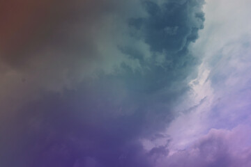 Obraz premium Beautiful sunset sky above clouds with dramatic light. Cabin view from airplane