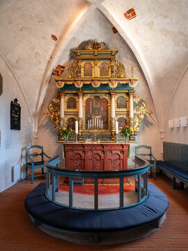 Altarpiece and altar rail in Sejer&oslash; Kirke, Sejerby, Sejer&oslash; island in Kattegat, Denmark