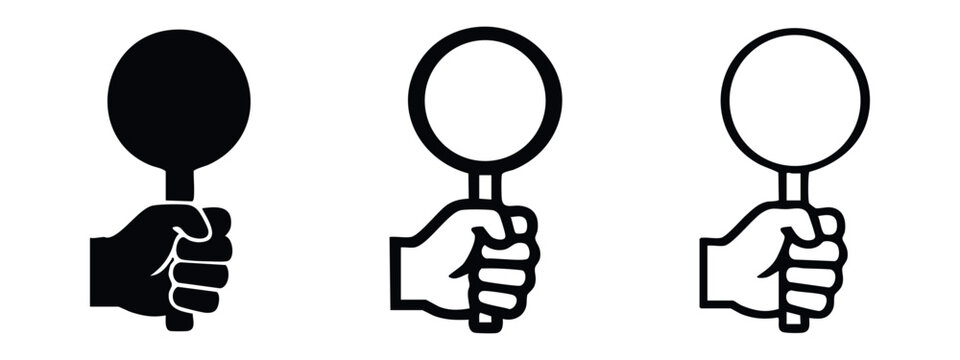 Hand holding a paddle or round sign icon set in black and white.
