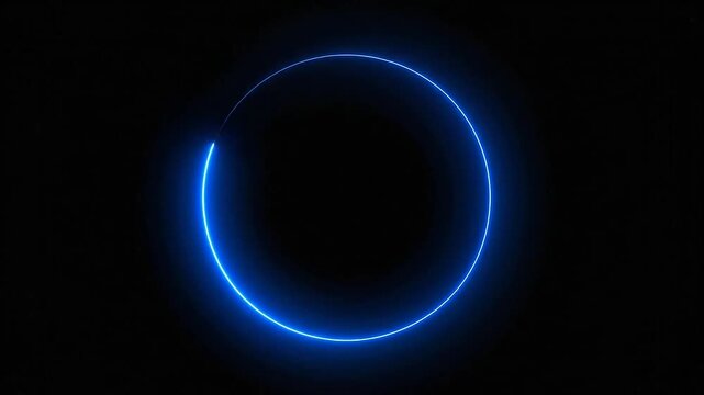 A glowing blue circle against a black background, perfect for abstract designs and concepts