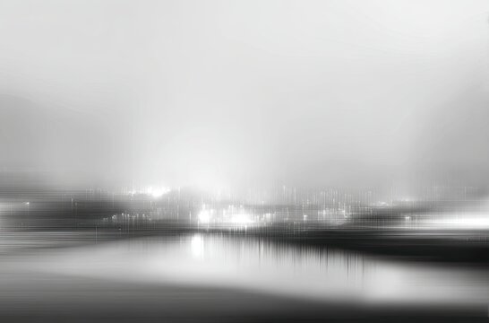 A blurred, grayscale abstract landscape evokes a sense of calm and mystery.