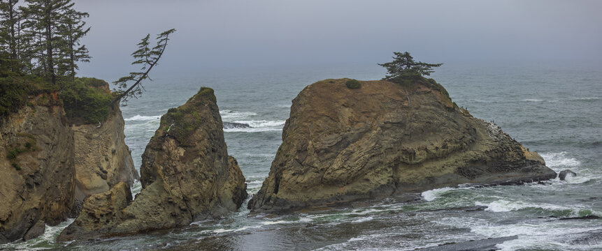Oregon coast sea stacks with waves hitting rugged shore