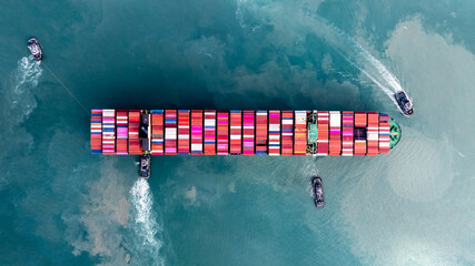 Container ship carrying container for import and export, business logistic and transportation by container ship boat in open sea, Aerial view container ship with copy space for design banner web © Kalyakan