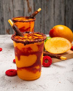 Mangonada, typical mexican mango smoothie with chamoy sauce and lime juice.