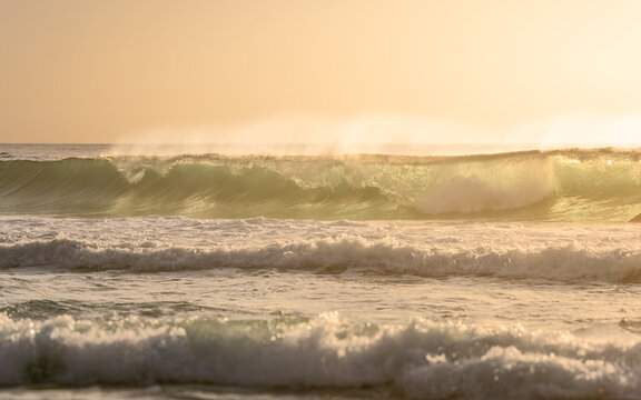 Crashing Waves in golden light on the California Coast