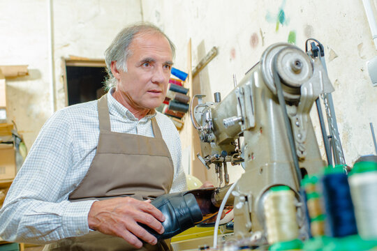 a cobbler is with a machine