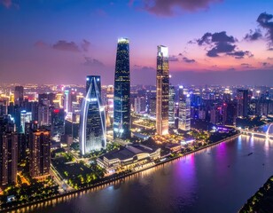Obraz premium A stunning aerial view showcases the illuminated skyline of a modern city at dusk.