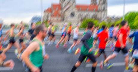 Obraz premium marathon runners in the city, motion blur