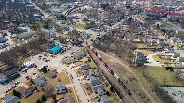 Video from a drone of a train stopped in Waukesha, WI, because of a crash, with police and fire first responders seen in the video.