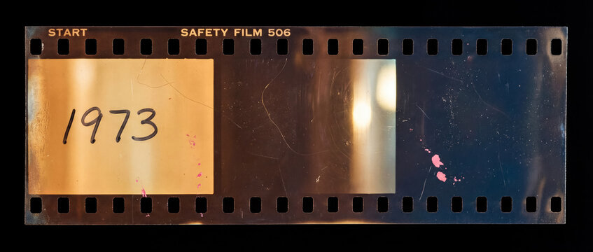35mm Film Strip Start with 1973 Frame Vintage Analog Negative on Black