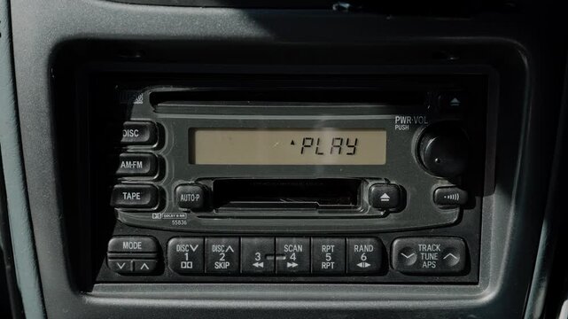 Insert a Cassette Into the Retro Car Audio CD Cassette Head Unit Deck and Press the Buttons to Start Playback, Fast Forward, and Auto-Reverse  |  Japan