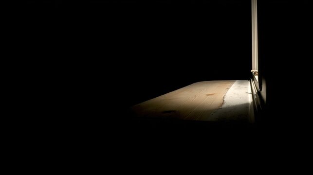 silent. Moonlight streaming through a window onto an empty wooden desk, creating a serene and contemplative late-night atmosphere. wellbeing guides.