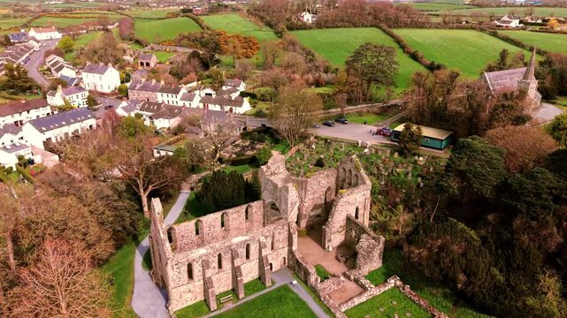 4K 60FPS aerial video GV approach of Greyabbey Monastery Ruins in Greyabbey, County Down in Northern Ireland. Produced in 3840x2160 and with Rec709 color.