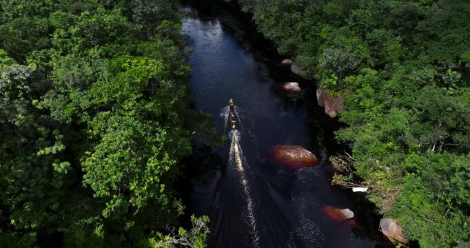 Motorboat With Tourists Navigating The Churun River In Canaima National Park, Venezuela. Aerial Shot