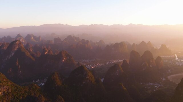 Karst Mountain Landscape Of The Li River Near Xingping At Sunrise In Guilin, China. Aerial Shot