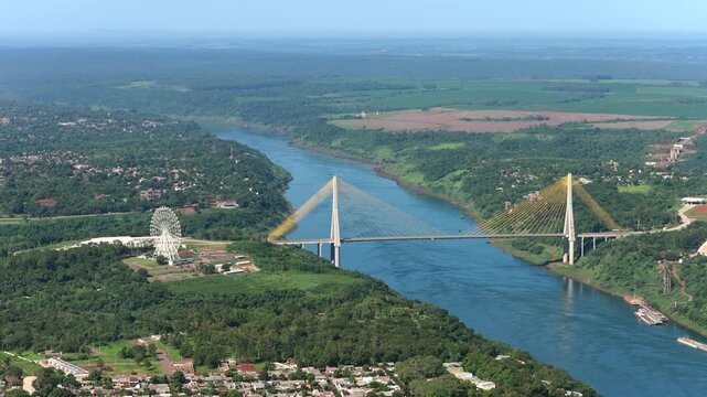 Aerial view of the new Integration Bridge with the Yup Star Ferris wheel and river crossing.