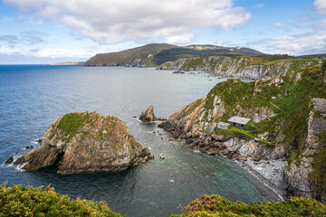 Coastal landscape with Loiba cliffs and old fisherman's hut, Galicia, Spain. © Andrea Tabaro