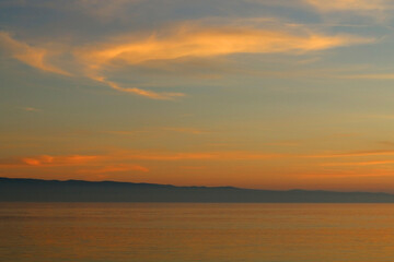 Obraz premium Colorful sunset or sunrise sky over the sea.