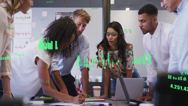 Team of six writing and pointing in business meeting, notes causing green data overlay guiding plan