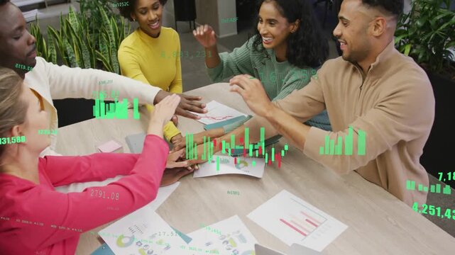 Team reading business charts woman reaching sparking hand stack under green data celebrating