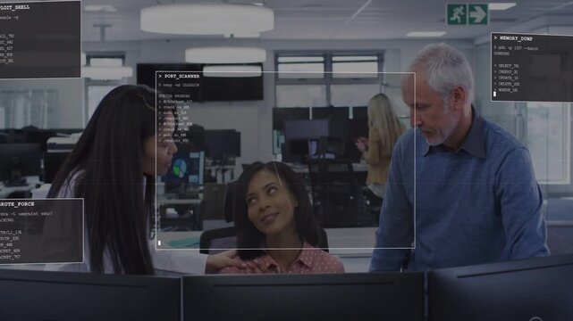 Three tech coworkers at desk, left dev pointing and explaining, creating monitor UI for debugging