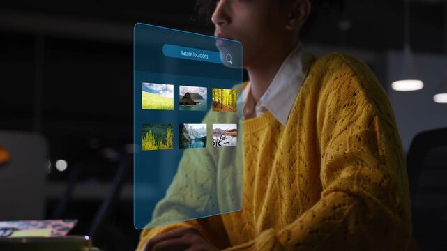 Holographic interface appearing, woman lifting head and studying thumbnails to choose nature scenes