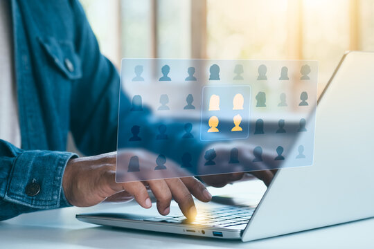 Business professional using AI recruitment system analyzing candidate profiles on virtual interface, human resources management, talent selection, hiring strategy, digital HR technology concept