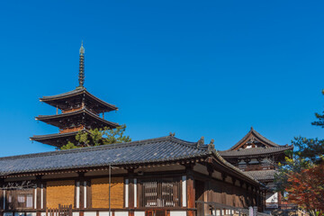 Fototapeta premium Horyu-ji Temple ,located in Nara is known as the oldest wooden structure in the world. Horyuji was registerd as UNESCO World Heritage site in 1993.