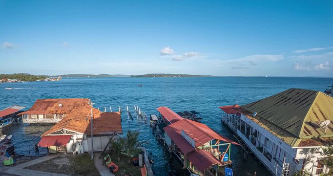 Day to night timelapse over Bocas del Toro town with changing light Panama