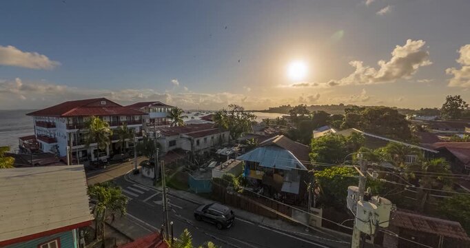 Day to night timelapse over Bocas del Toro town with changing light Panama