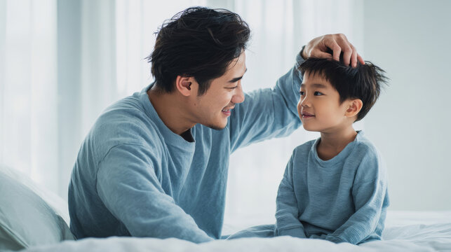 Father and child share joyful moment at home in the morning light with simple gestures and smiles