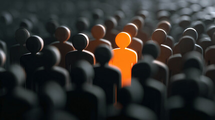Fototapeta premium A glowing orange human figure stands in the center of a crowd of dark silhouettes on a blurred background, representing the concept of leadership, uniqueness, personalization