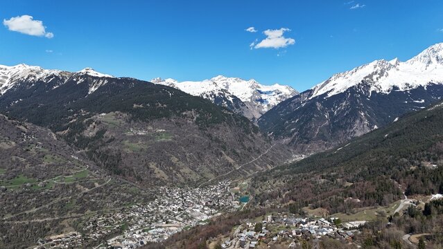 Aerial panaromic view of Courchevel, Bozel between snowy mountains.