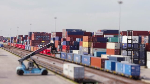 time lapse train loading container goods in port shipment terminal facility truck import export