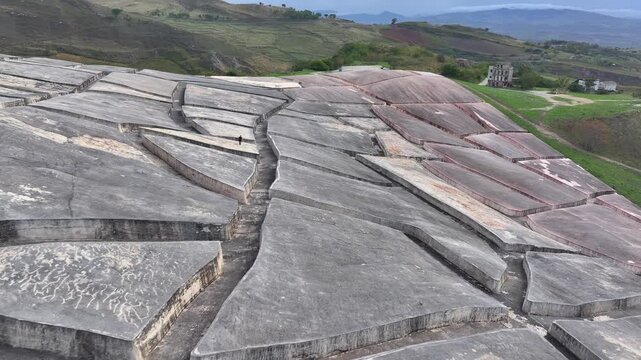 Aerial Shot of Cretto di Burri in Sicily: monumental concrete labyrinth over old Gibellina ruins in Sicily, Italy.