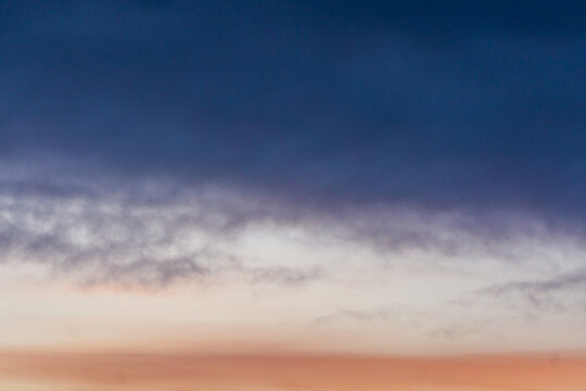 Gradient sky with soft clouds at sunset