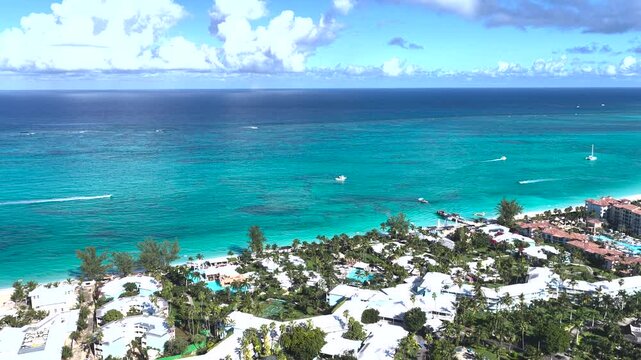 Grace Bay Beach At Turks And Caicos In Overseas Territory England. Seascape Skyline. Downtown Landscape. Summer Travel. Grace Bay Beach In Turks And Caicos England. Highrise Buildings.