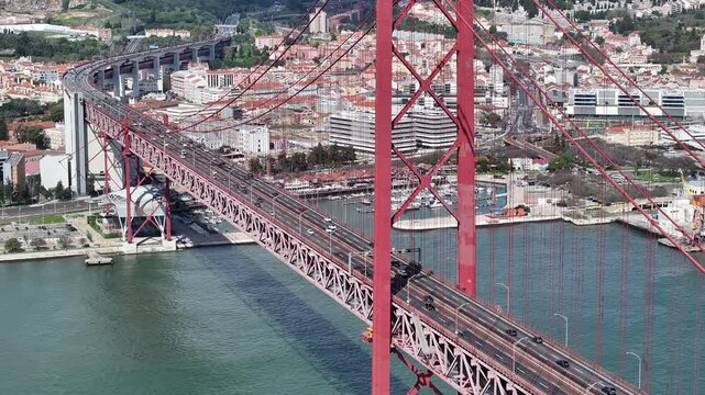 25Th Of April Bridge At Lisbon In Lisbon District Portugal. Stunning Downtown Cityscape. Cable Bridge Scene. 25Th Of April Bridge At Lisbon In Lisbon District Portugal. Cable Bridge Scenery.