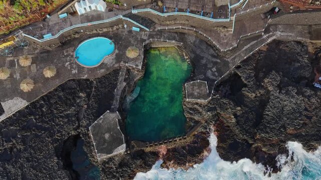 Aerial View People Swimming in Charco Azul Natural Pool La Palma Canary Islands; Public Recreation Picnic Area and Summer Holiday Lifestyle