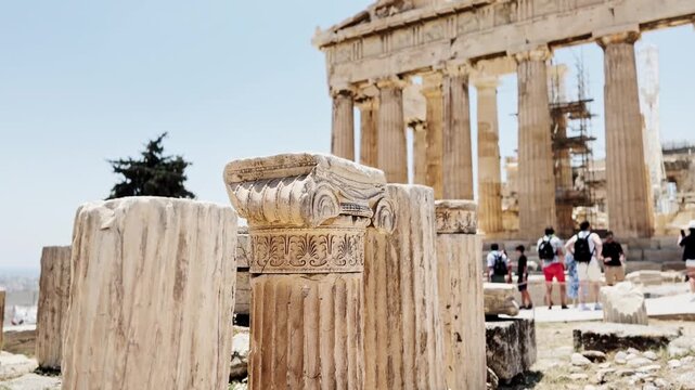 Ancient parthenon ruins with crowd visiting acropolis in athens