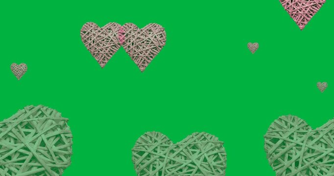 Digital animation of multiple pink heart icons floating against black background