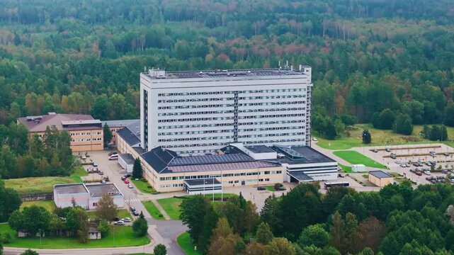 Aerial view Liepaja Regional Hospital Latvia drone pulling away slowly