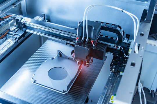 3D printer or additive manufacturing and robotic automation technology.