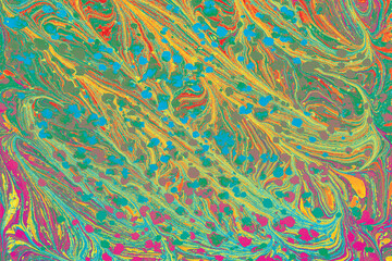 Colorful abstract Ebru marbling background with vibrant liquid ink swirls