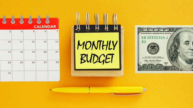 Monthly budget planner notebook concept, personal finance management, expense tracking and income planning, household budgeting, financial organization, saving money strategy and money management