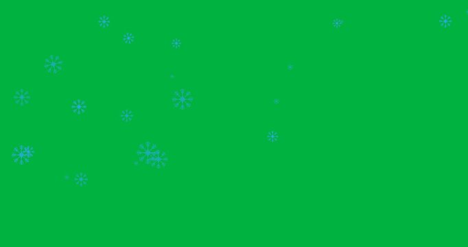 Digital animation of multiple blue snowflakes falling against black background