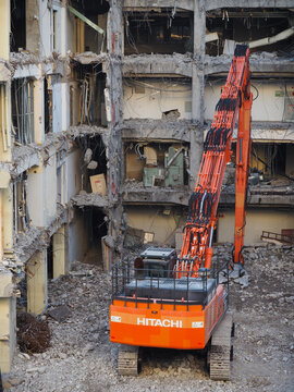 CHIBA, JAPAN - December 26, 2023: An excavator on the demolition site of an old Japan Railways office buildings in Chiba City.