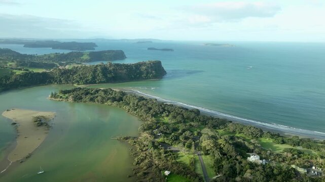 Aerial View Park, River, and Distant Beach