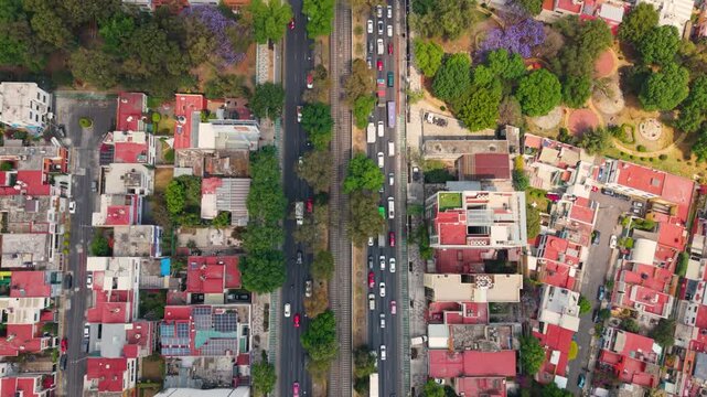 Aerial perspective of traffic flow on Calzada de Tlalpan, Mexico City